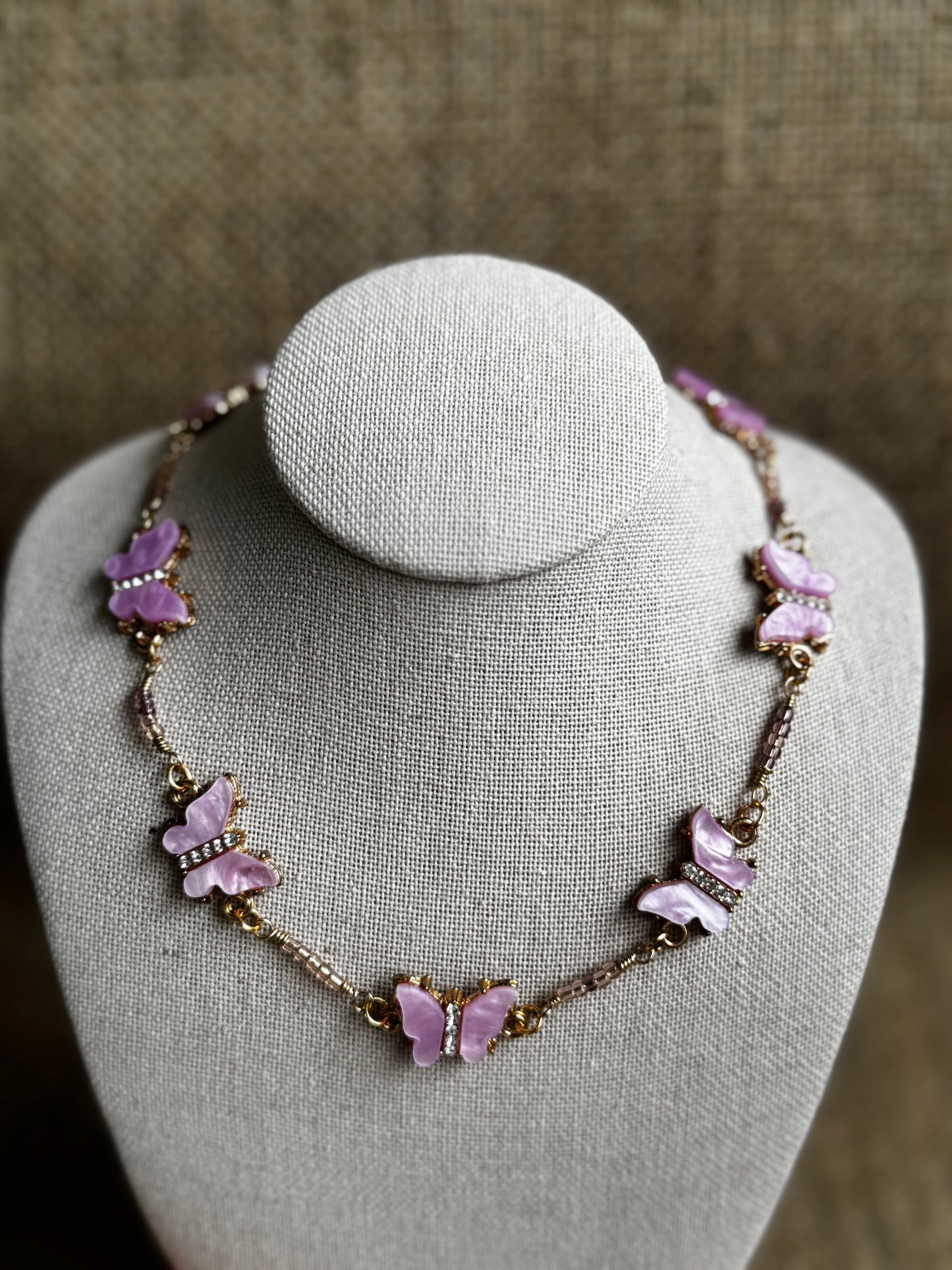 Purple gold butterfly necklace